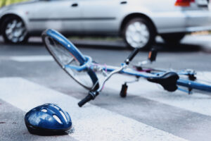 blue-bike-and-blue-helmet-after-pedestrian-crash