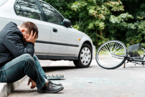 man-upset-after-bike-crash-with-car