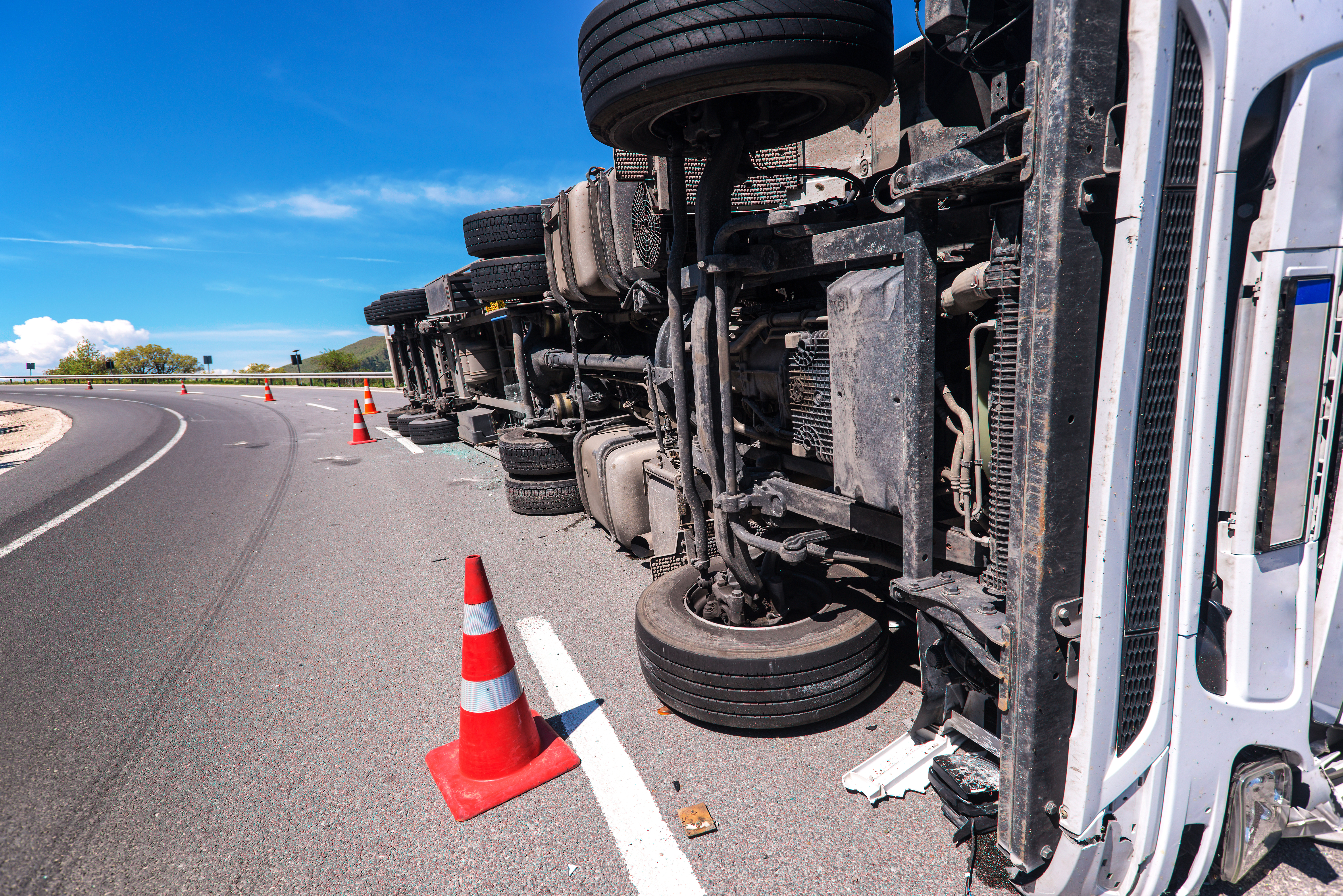 overturned truck with a cone