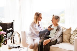 nurse-taking-patient’s-pulse