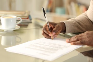 black-woman-signing-contract