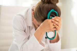 female doctor upset over making a mistake