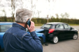 man calling for help after rear collision