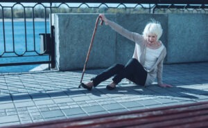woman falling on the dock