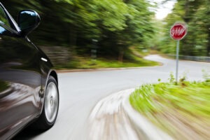 car-speeding-past-a-stop-sign
