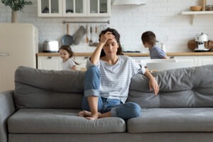 sad woman on couch