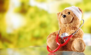 teddy bear with bandages and stethoscope