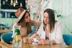 woman grieving with friend
