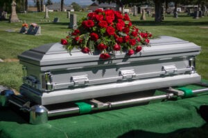 casket-with-roses-on-it