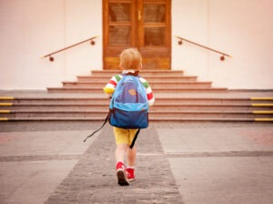 child-walking-up-to-school