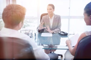 female lawyer talking with clients