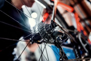 man readying bike to ride