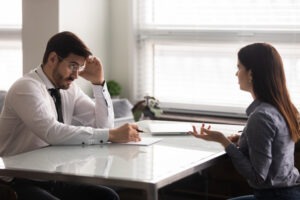 woman arguing with her attorney