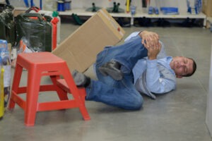 worker-falling-off-stool