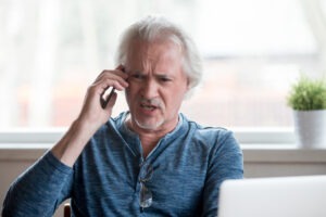 angry employee talking on phone