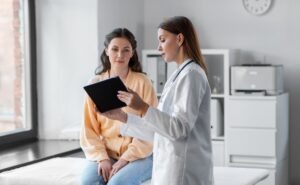 female patient talking to pulmonologist