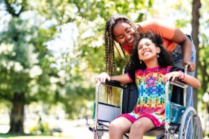 girl in a wheelchair in a park