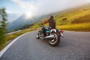 man driving motorcycle