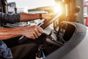 close-up on truck driver’s hands