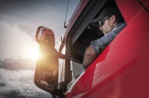 trucker looking in rearview mirror