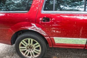 red car after sideswipe